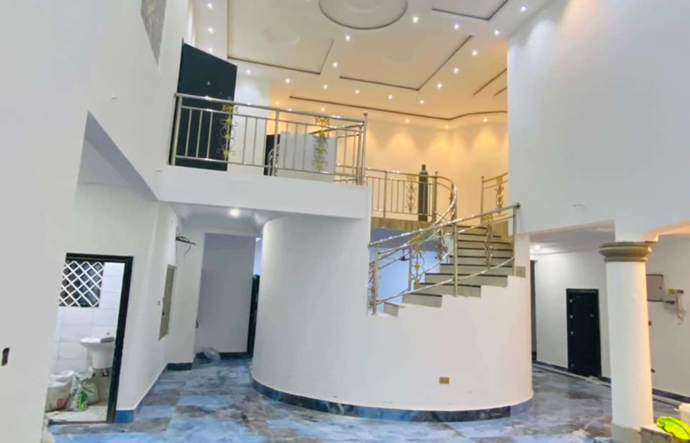 Curved Staircase & Mezzanine